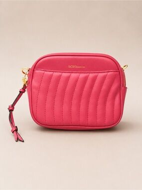 BCBGeneration Quilted Hot Pink makeup bag with Gold Hardware